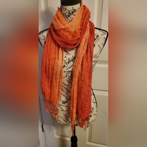 Ombre orange scarf with gold accent threads. Perfect condition. One size.